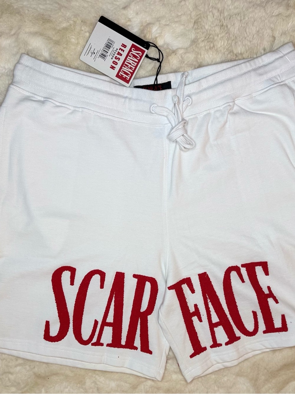 Reason White Shorts with Red "SCAR FACE" Lettering